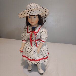 VINTAGE PORCELAIN DOLL BY MANN